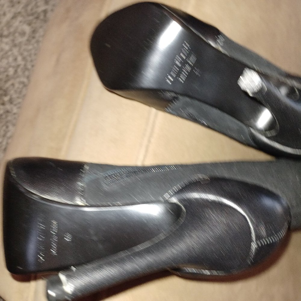 Thigh high Colin Stuart suede boots.